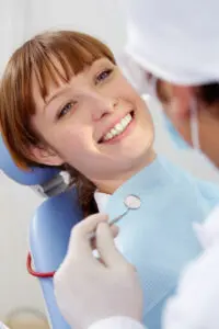 woman smiling in dental chair